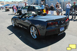 2014 Chevrolet Corvette convertible, Jay Leno driving, Ed Welburn as passenger