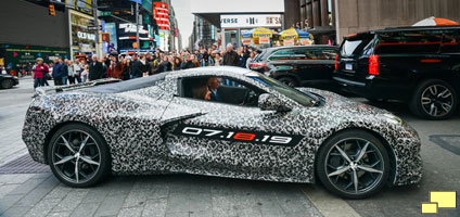 Chevrolet Corvette Chief Engineer Tadge Juechter and General Motors Chairman and CEO Mary Barra drive in a camouflaged next generation Corvette down 7th Avenue near Times Square Thursday, April 11, 2019 in New York, New York.