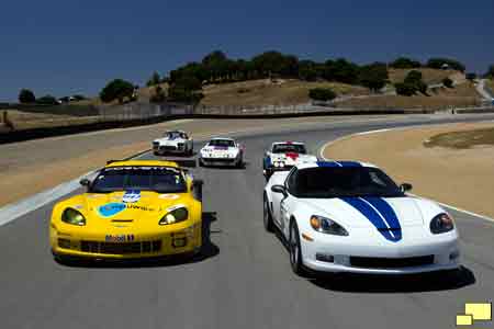 Corvette Racing, American Le Mans Series, Laguna Seca, April 20, 2010, Corvette celebrates 50 years at Le Mans, 2010 #4 C6.R GT2, 2011 VIN 001 GM Design Special Anniversary Z06, 1960 #2 Le Mans competitor, 1969 #49 Le Mans competitor (raced at Le Mans in 1973), and 1967 #9 Le Mans competitor  