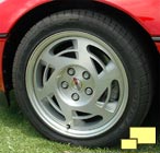 1990 Corvette wheel with exposed lug nuts